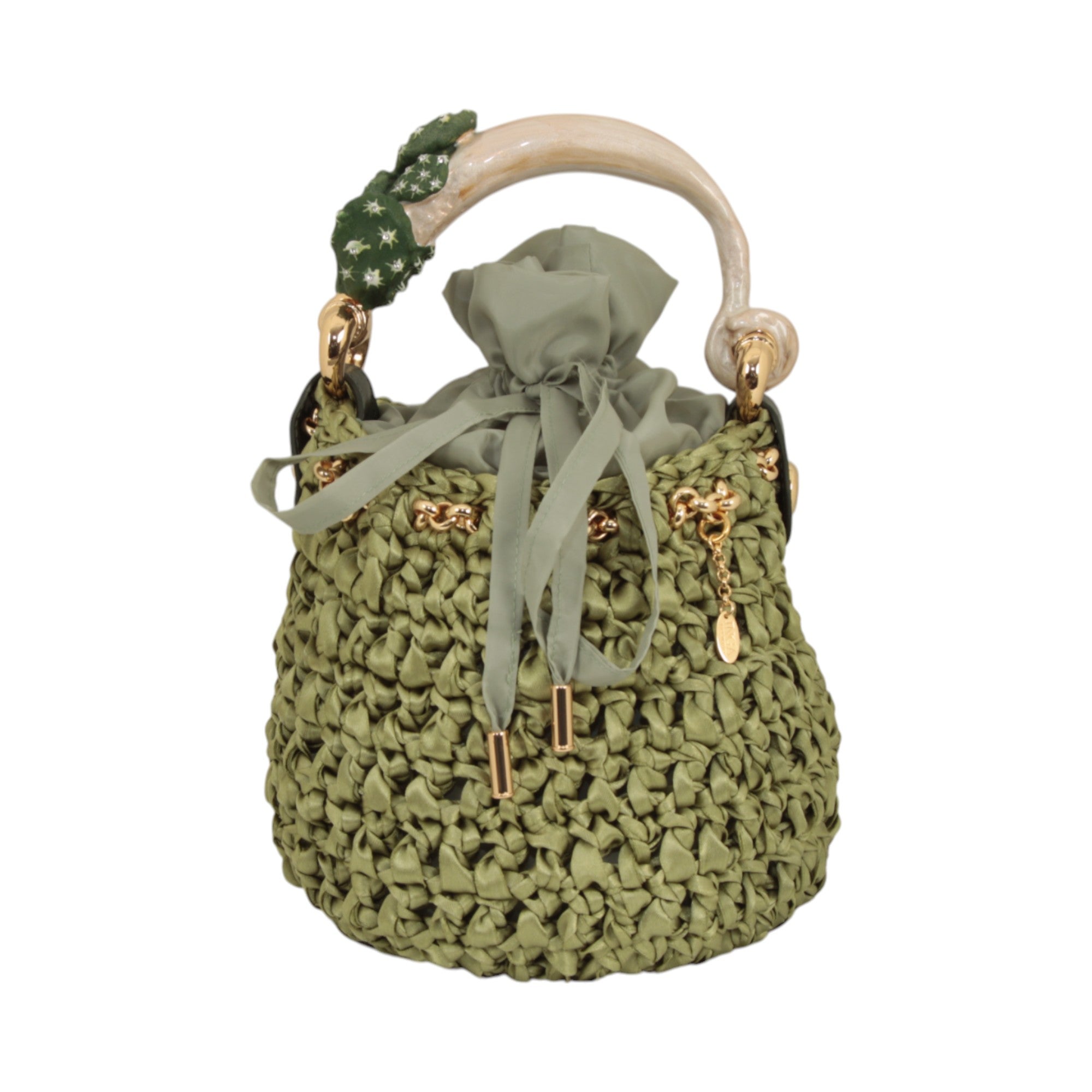 Bucket bag with cactus sculpture handle in hand-painted enamel and crocheted satin body
Made in Italy bucket bag with gold-tone cactus handle and removable chain strap
Artisanal bucket bag with sculptural cactus handle by Inga Sirmione
