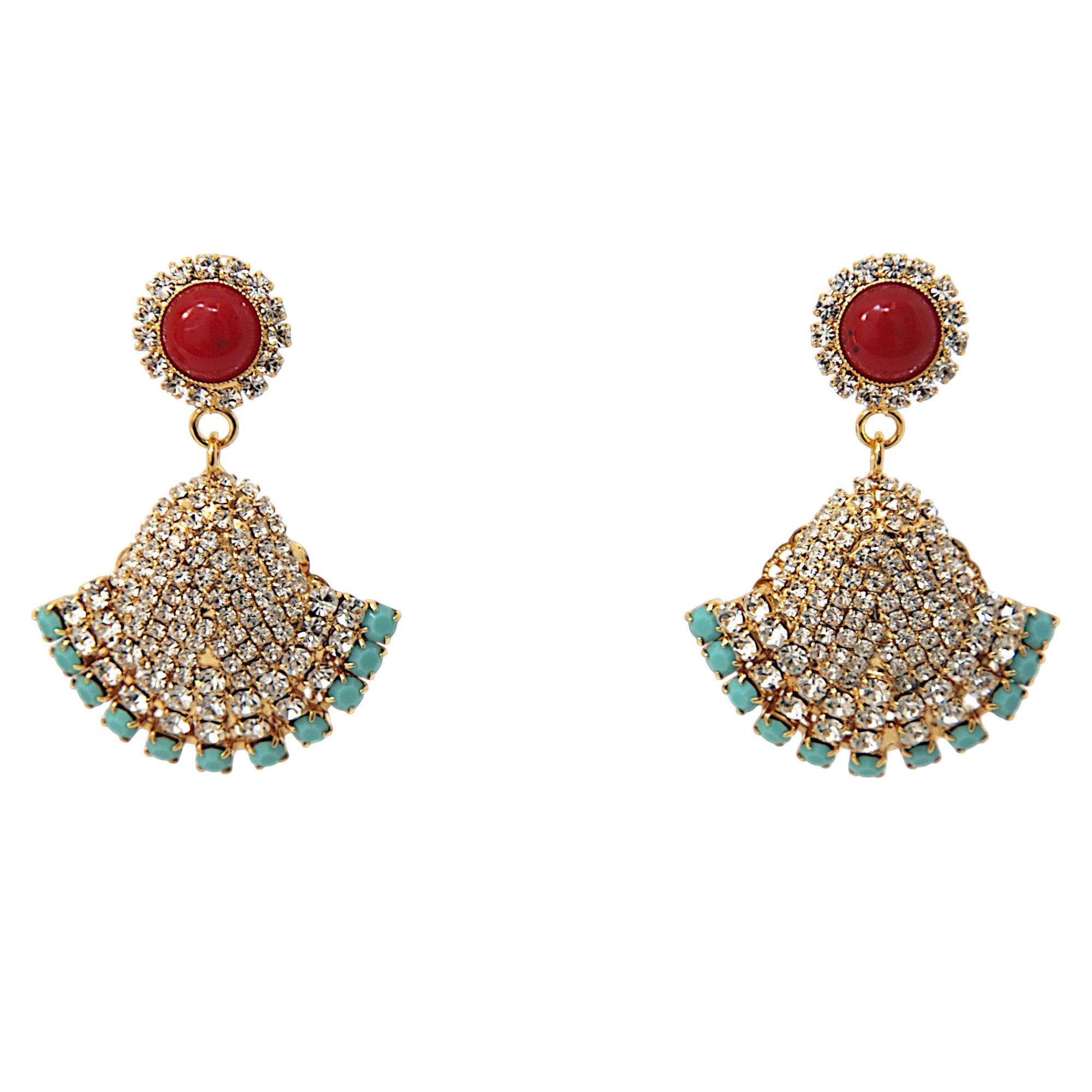 Venere Coral Fan Earrings with coral-tone cabochon, crystal pavé fan motif and turquoise accents
Statement gold-tone fan earrings with red coral-style top and sparkling crystal embellishment
Mediterranean-inspired drop earrings from the Venere Capsule Collection
Venere Coral Fan Earrings worn with elegant evening styling
Crystal fan earrings with coral and turquoise details, luxury boutique jewelry