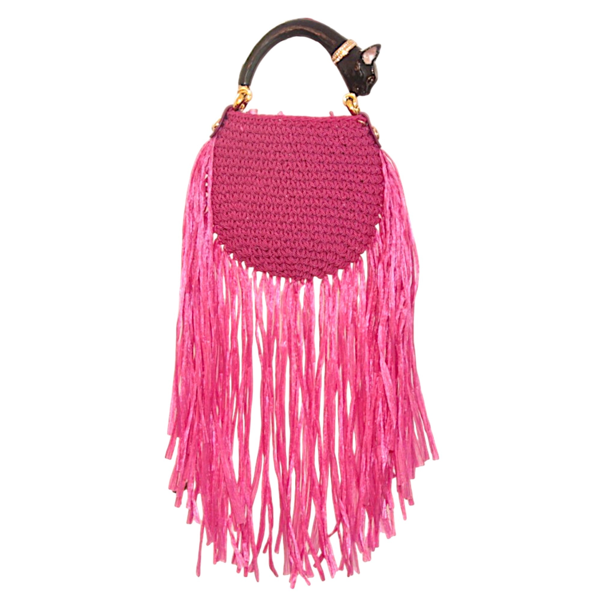 Fuchsia woven bag with dramatic fringes and sculptural black cat handle featuring hand-painted enamel and 24k gold-plated details. Saint Tropez Collection.