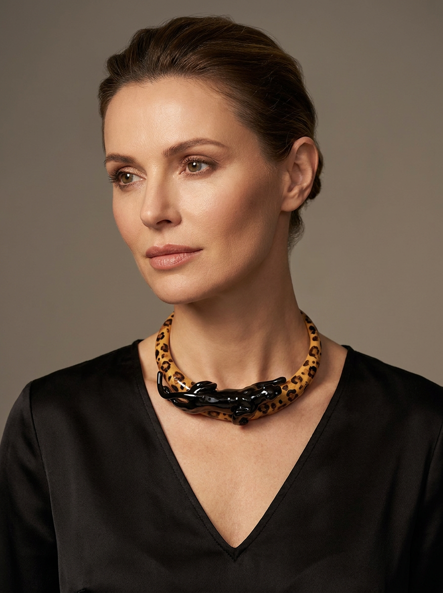 Woman wearing Savage Royal Black animalier necklace with glossy black panther motif – INGA Sirmione