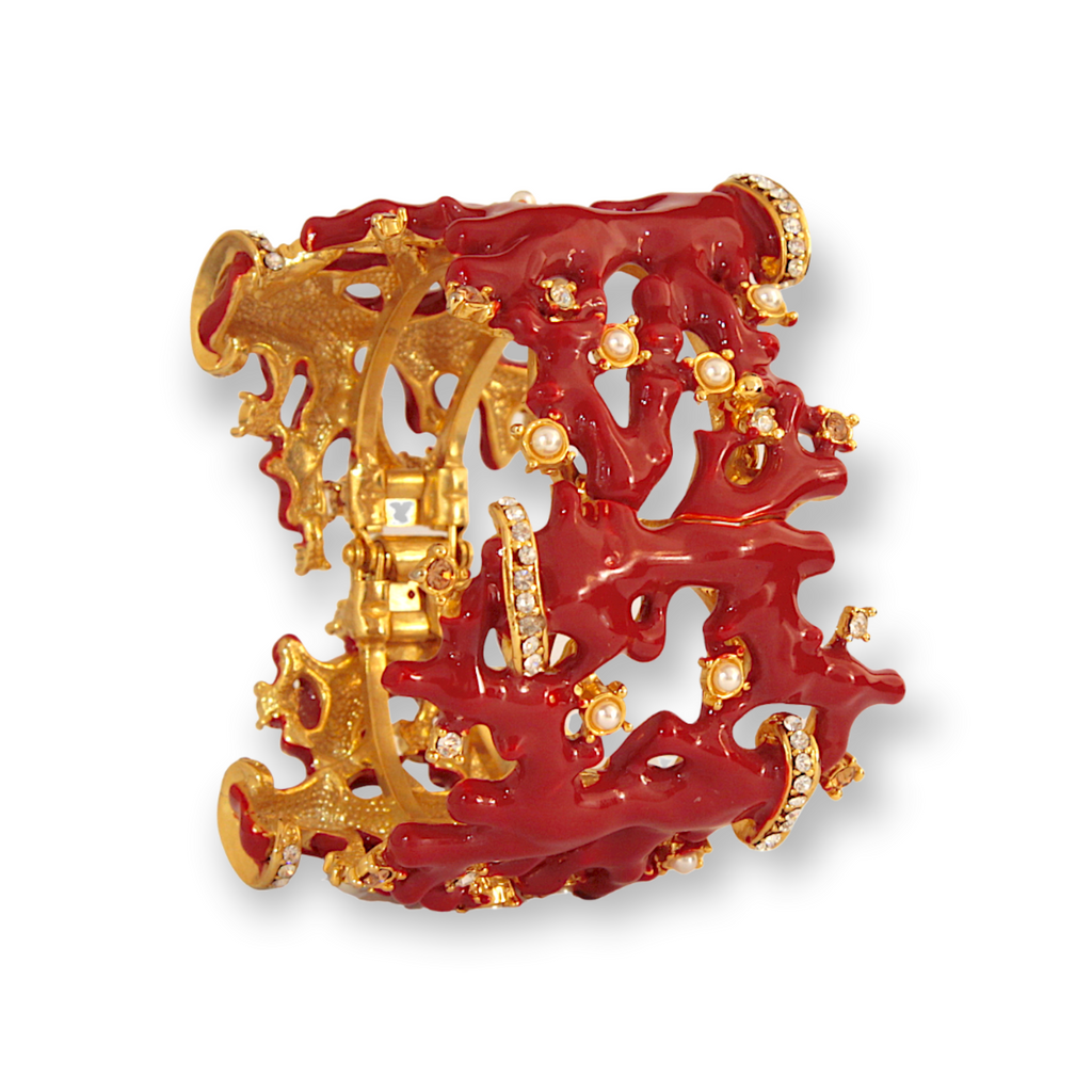Made in Italy. Carlo Zini Magnificent bracelet with a coral reef theme Hypoallergenic rhodium plated in 18 KT gold and multicolor enamels elegant construction in swarovski crystals, pearls and multicolored resins 100% handmade