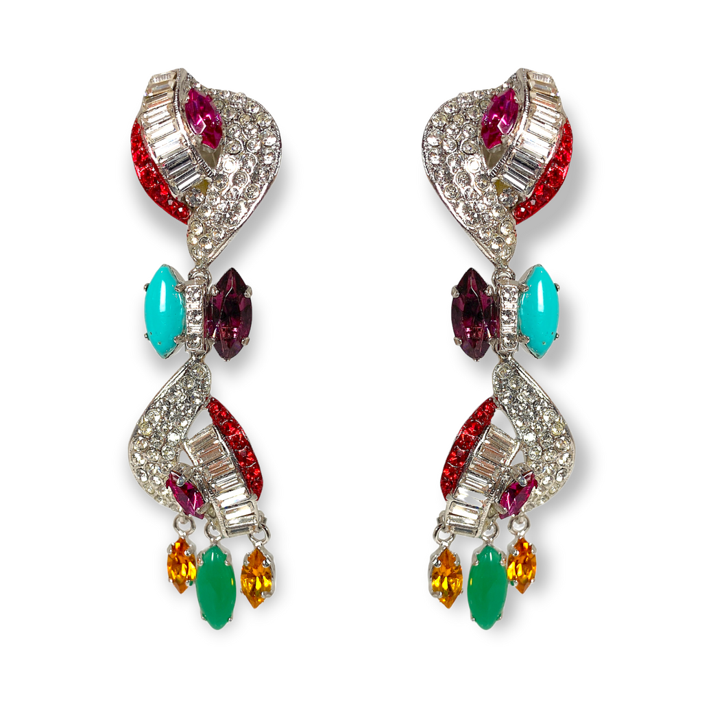 Carlo Zini  Precious Swarovski® crystals inspires the unique design of this extraordinary earrings 